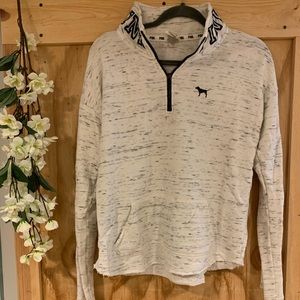 White quarter zip from PINK with black detailing